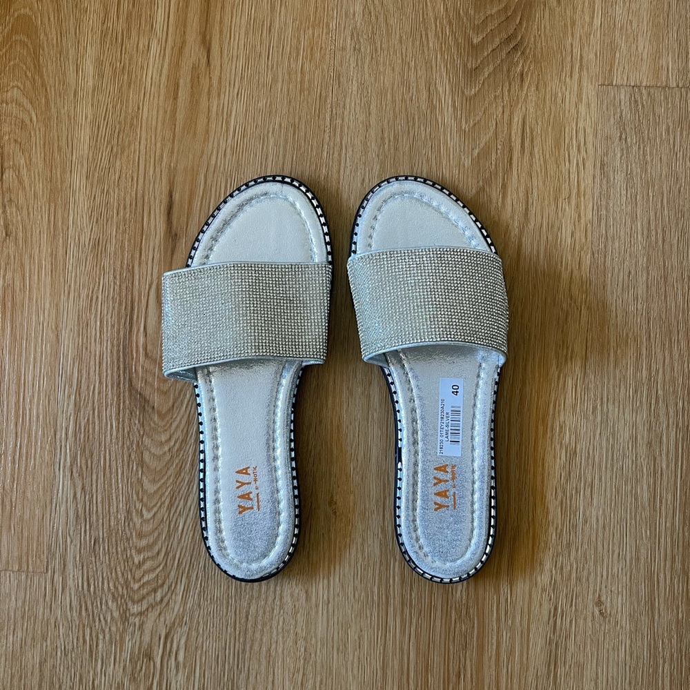 Brand new size 10-9.5 shinny slippers